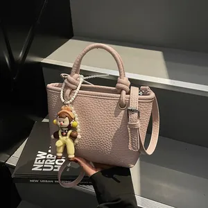 Women Fashion Textured Litchi Grain PU Leather Handbag With Cartoon Charm Adjustable Strap Shoulder Crossbody Bucket Bag