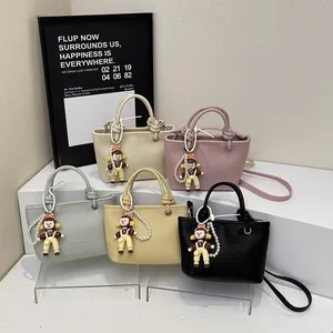 Mini lychee leather tote bags in five colors with cute doll charms and pearl chains