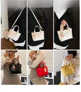 Collage of trapezoid bucket bags in white black red yellow with astronaut charm