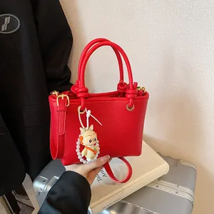 Fashion Women PU Leather Litchi Pattern Handbag Knot Handle Small Crossbody Tote Bag With Cartoon Rabbit Pendant For Commute
