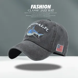 Detail of shark embroidery and American flag patch on washed cotton baseball cap