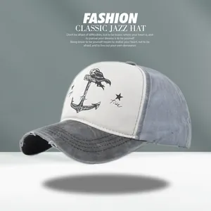 Detailed view of retro distressed baseball cap with anchor print and worn-out brim effect
