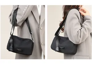 Vue détaillée du grand sac de voyage étanche en tissu Oxford avec large bandoulière