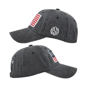 Vista lateral de gorra de béisbol gris desgastada con bordado USA y bandera americana