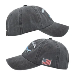 Detail view of washed cotton baseball cap with blue marlin embroidery and USA flag patch