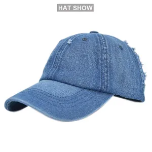 Macro detail of distressed denim baseball cap with vintage frayed edges and blue stitching