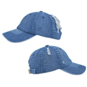 Detailed macro view of distressed denim baseball cap with vintage metal buckle