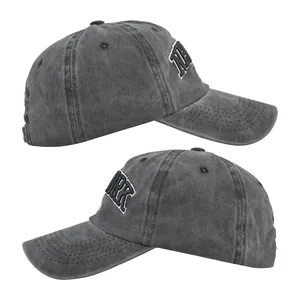 Detailed close-up of vintage washed grey cotton baseball cap with New York embroidery