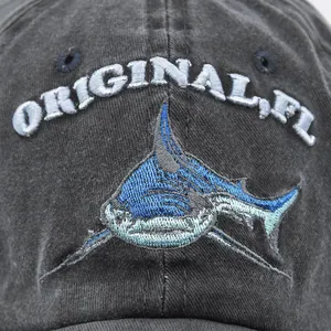Distressed charcoal baseball cap with blue shark embroidery and Original FL text
