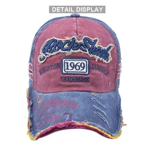 Detailed close-up of vintage embroidery and distressed brim on the 1969 baseball cap