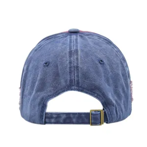 Detailed back view of vintage washed cotton baseball cap with adjustable metal buckle