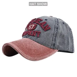 Close-up of 3D embroidery and washed denim texture on vintage baseball cap