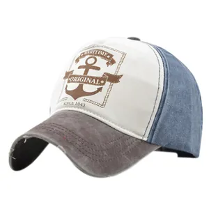 Distressed vintage maritime baseball cap with anchor print and blue denim finish