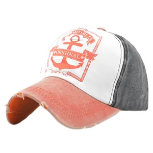 Close-up of vintage tricolor baseball cap featuring anchor print and distressed brim