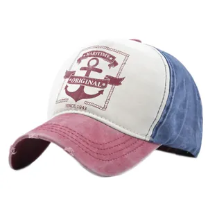 Detail of vintage anchor print on a distressed tri-color washed cotton baseball cap