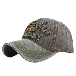 Macro detail of 3D embroidery and vintage washed cotton fabric on baseball cap