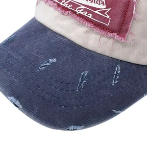 Macro detail of retro distressed baseball cap with embroidery and frayed brim holes