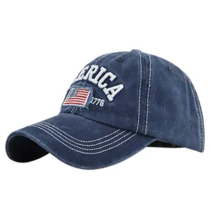 Detailed close-up of America 1776 embroidery and US flag patch on vintage baseball cap