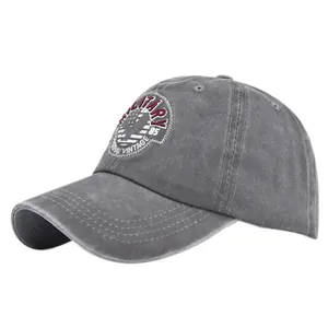 Close-up of MILITARY 85 embroidery on grey washed vintage cotton baseball cap