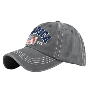 Detail of vintage gray baseball cap with America 1776 embroidery and flag patch