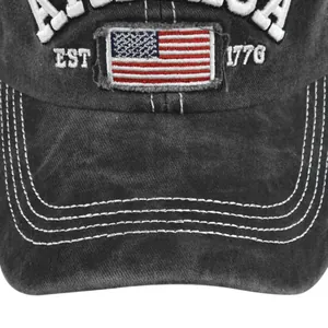 Detail of vintage grey baseball cap featuring America 1776 embroidery and flag patch