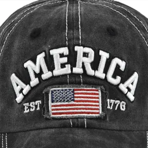 Close-up of vintage washed cotton baseball cap with 3D America embroidery and US flag patch