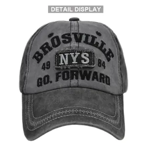 Detail view of vintage grey baseball cap with high-quality embroidery and 3D textured stitching