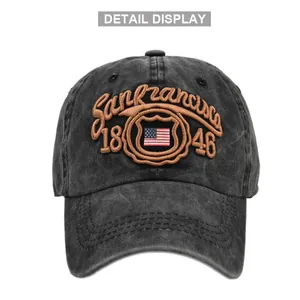 Detail view of San Francisco 1846 vintage embroidery on a washed black cotton baseball cap