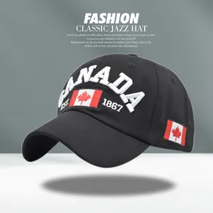 Close-up of premium embroidery on black cotton baseball cap with Canada maple leaf detail