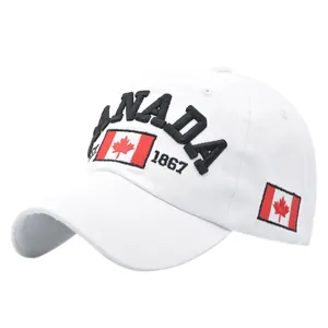 Close-up of black CANADA embroidery and flag on a white cotton baseball cap