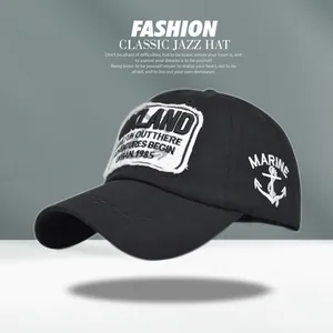 Close-up of black baseball cap with Oakland embroidery and marine anchor side detail