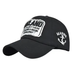 Detailed embroidery of Oakland Urban 1985 on a black cotton twill baseball cap