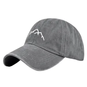Detail of washed charcoal cotton baseball cap with white embroidered mountain peak design