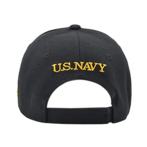 Rear view of black tactical cap with yellow U.S. NAVY embroidery and velcro strap