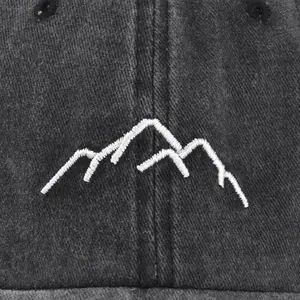 Washed vintage baseball cap in dark grey canvas with mountain embroidery detail
