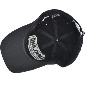 Internal detail of OAKLAND baseball cap showing cotton stitching and quality lining