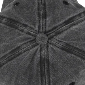 Detailed top view of charcoal grey washed cotton baseball cap with six-panel crown structure