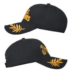 Close-up of golden USMC Marines embroidery and eagle globe anchor on black baseball cap