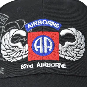Detailed embroidery of 82nd Airborne insignia on a black canvas baseball cap