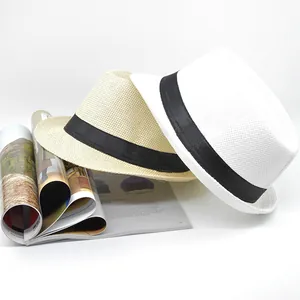 Detailed weave of beige and white summer straw fedora hats with black ribbons