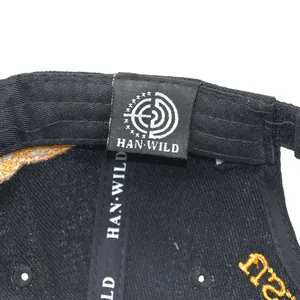 Detailed interior of tactical baseball cap showing HAN WILD branding and reinforced seams