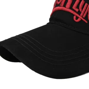 Detailed macro view of black cotton baseball cap with red 3D Brooklyn embroidery