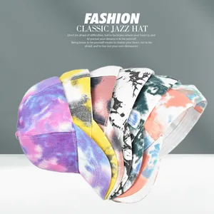 Side view of assorted vibrant tie-dye baseball caps showcasing various colorful patterns