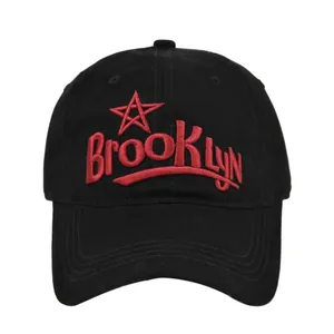 Black cotton baseball cap featuring 3D red Brooklyn embroidery and star on white background
