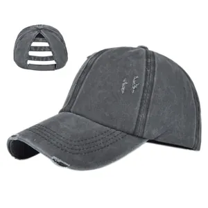 Detail of dark grey distressed ponytail baseball cap featuring unique elastic back opening