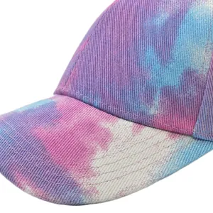 Detailed close-up of distressed tie-dye baseball cap brim with durable parallel stitching
