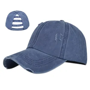 Distressed blue washed cotton ponytail baseball cap with elastic criss-cross back straps