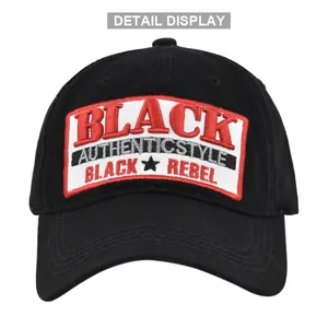 Dettaglio del ricamo BLACK REBEL su berretto da baseball in cotone nero stile vintage