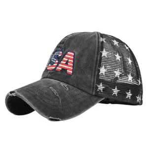 Close-up of vintage washed trucker hat with USA flag embroidery and star mesh details