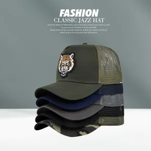 Vertical stack of mesh trucker hats in various colors with detailed tiger head embroidery